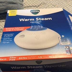 Vicks Warm Steam Vaporizer with vapor steam liquid